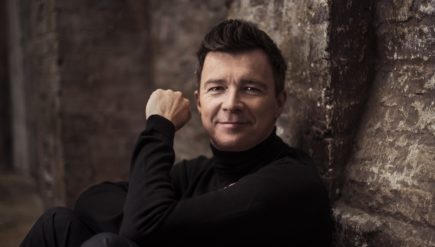 "If you look back at photographs of yourself from many years back, you probably look at them and cringe a little bit. I'm in that same boat," Rick Astley says of his '80s music videos.
